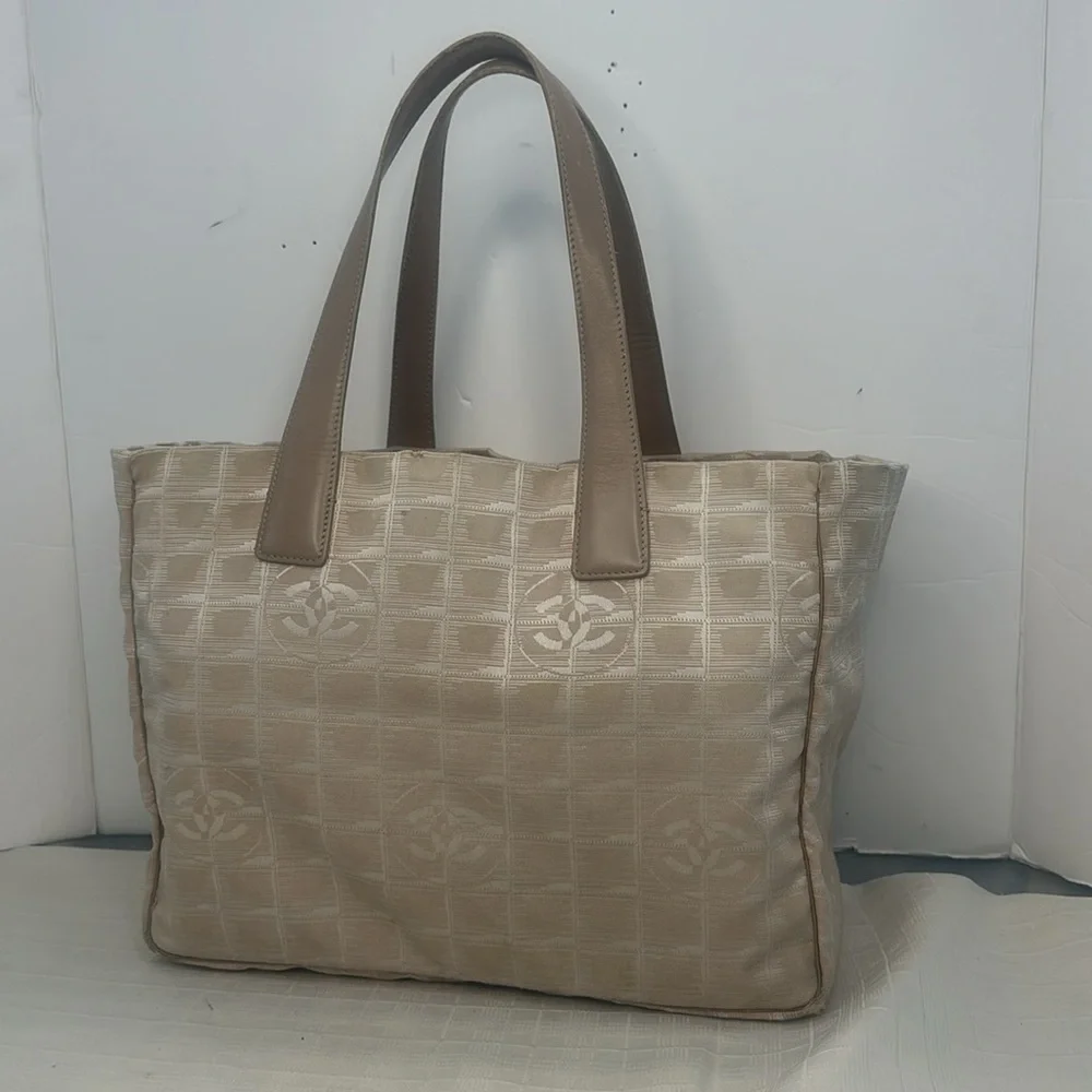 Chanel Travel Line tote in light beige / pale pinkish canvas